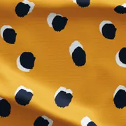 Coton à pois jaune moutarde avec gros pois noirs et blancs